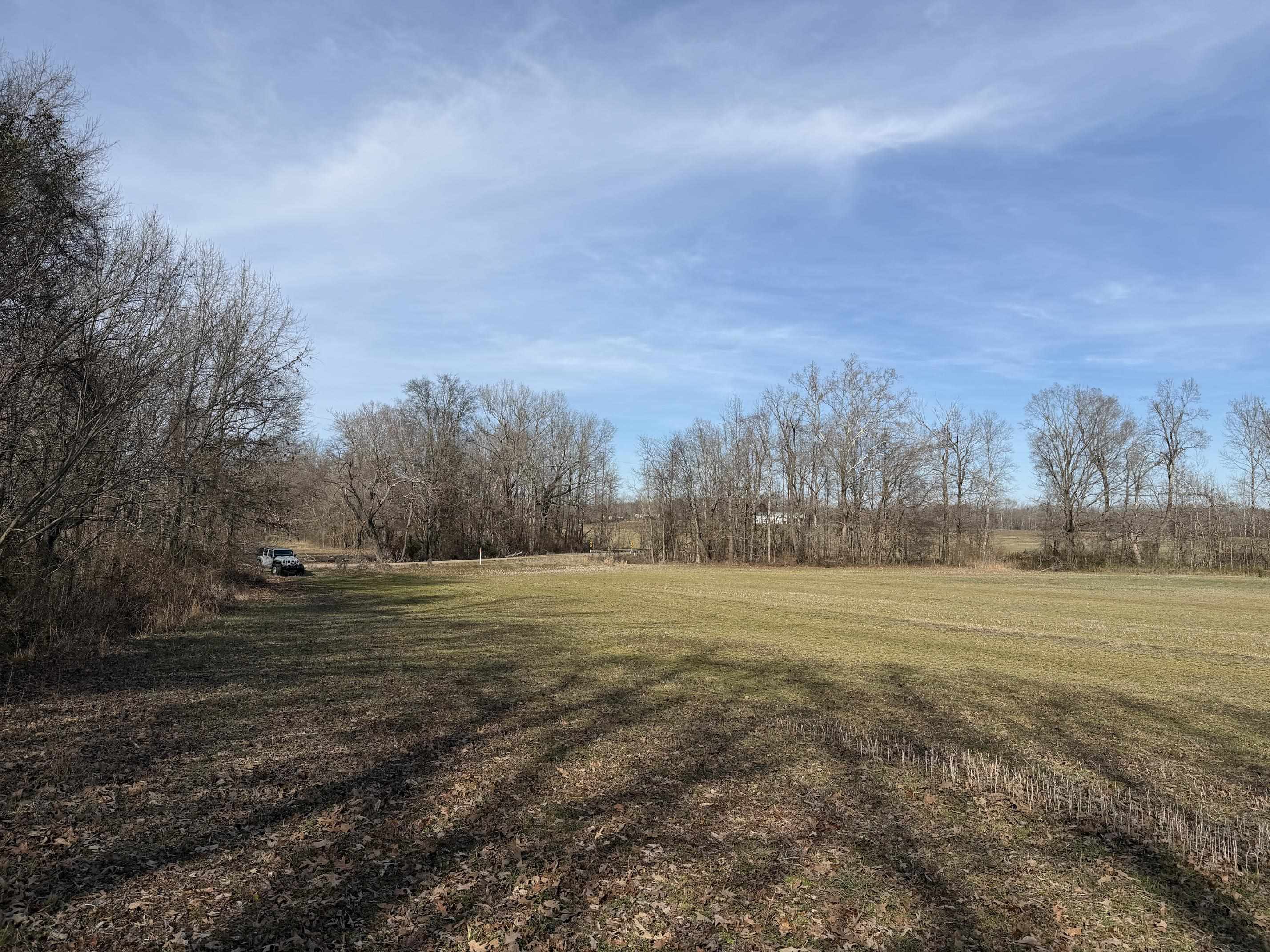 1 Glen Harris Road Adamsville, TN 38310 - Photo 14 of 21 a view of an ocean beach and trees