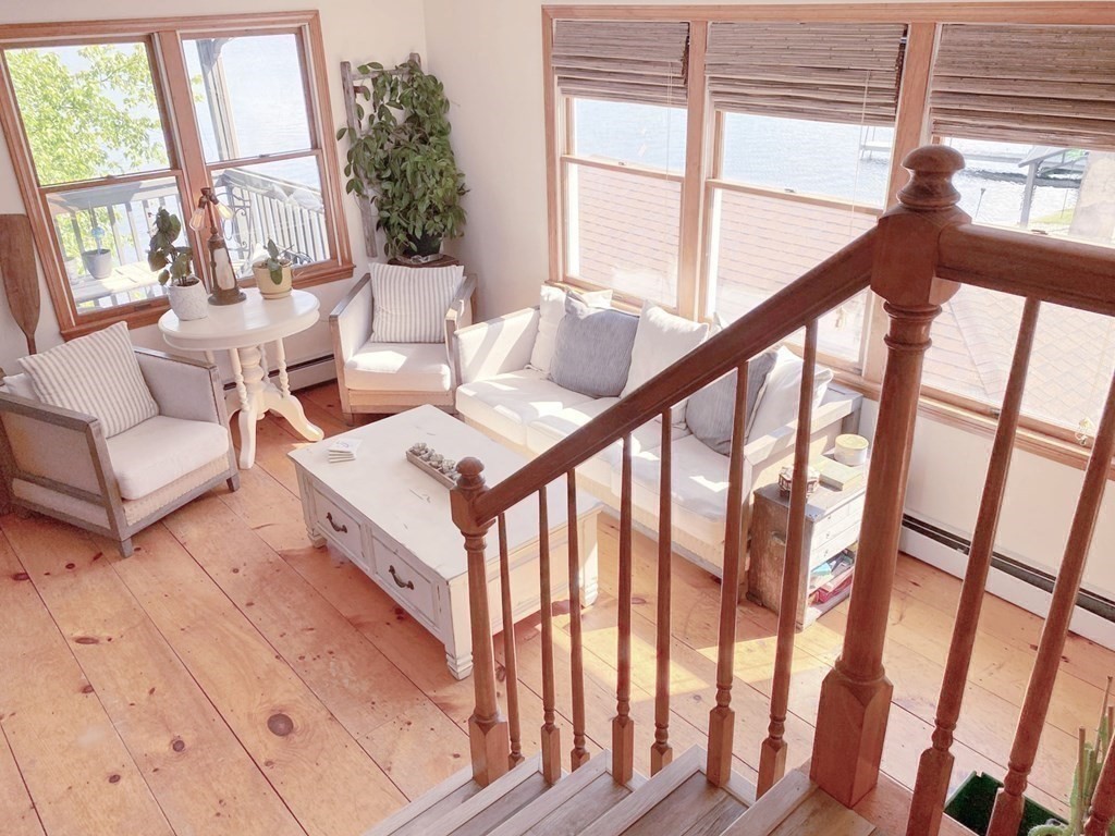 70 Uxbridge Road Mendon, MA 01756 - Photo 19 of 42 a living room with furniture and a large window