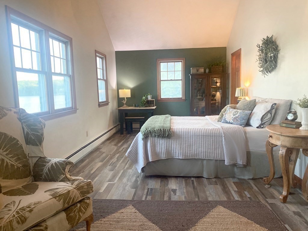 70 Uxbridge Road Mendon, MA 01756 - Photo 20 of 42 a bedroom with a bed and wooden floor