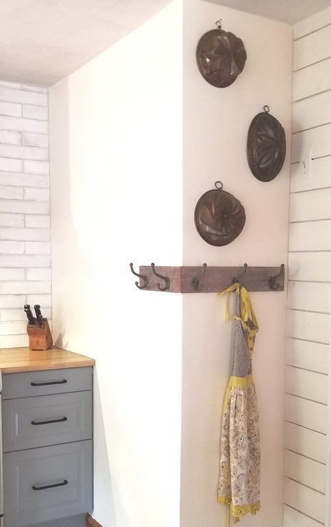 70 Uxbridge Road Mendon, MA 01756 - Photo 7 of 42 a kitchen with a sink and a shower