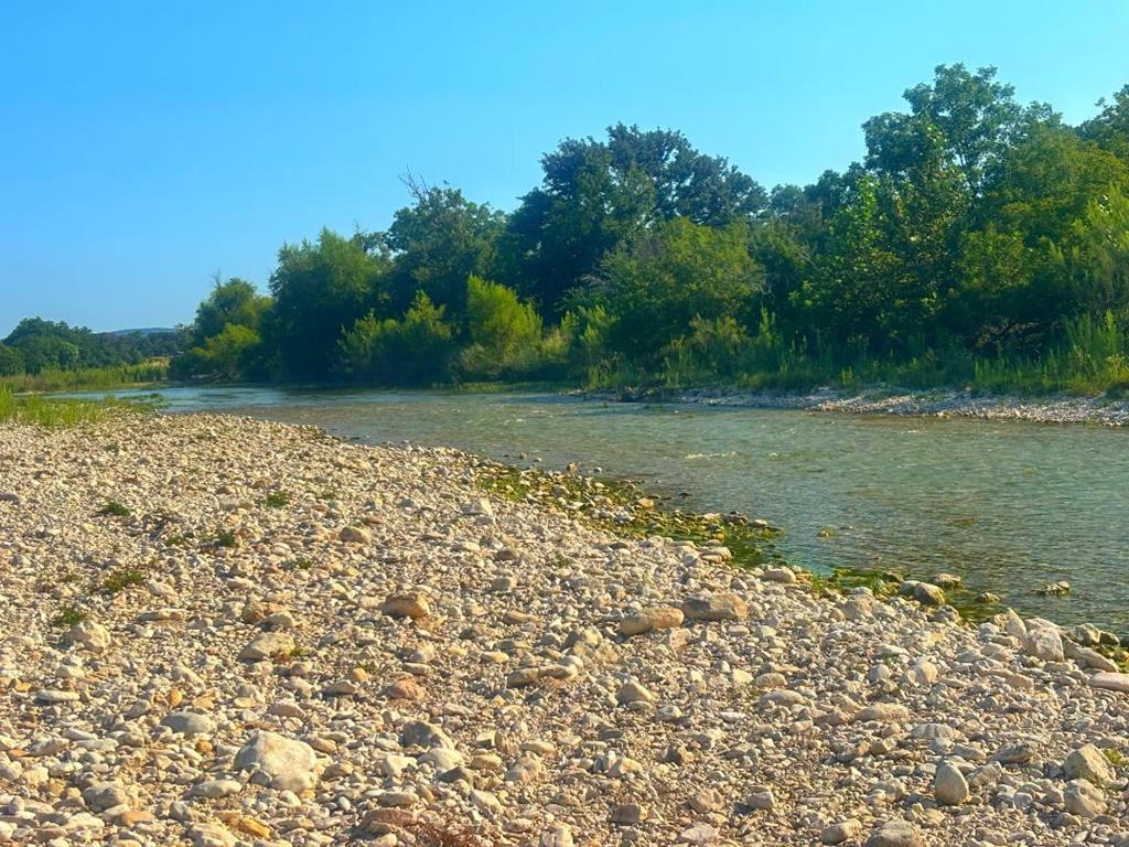380 South Rr 335 Barksdale, TX 78828 - Photo 18 of 29 a view of a lake with a yard