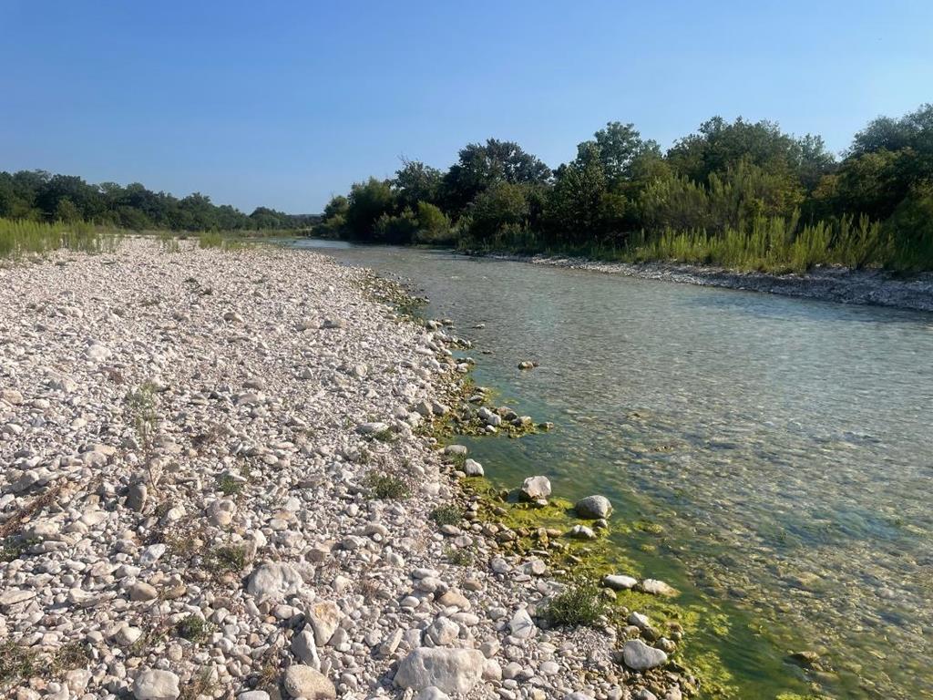 380 South Rr 335 Barksdale, TX 78828 - Photo 26 of 29 a view of a lake with a mountain in the background