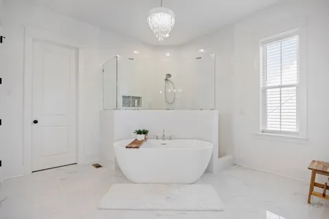 a bathroom with a granite countertop toilet sink and a mirror