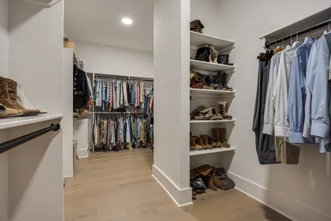 a livingroom with workspace and a couch