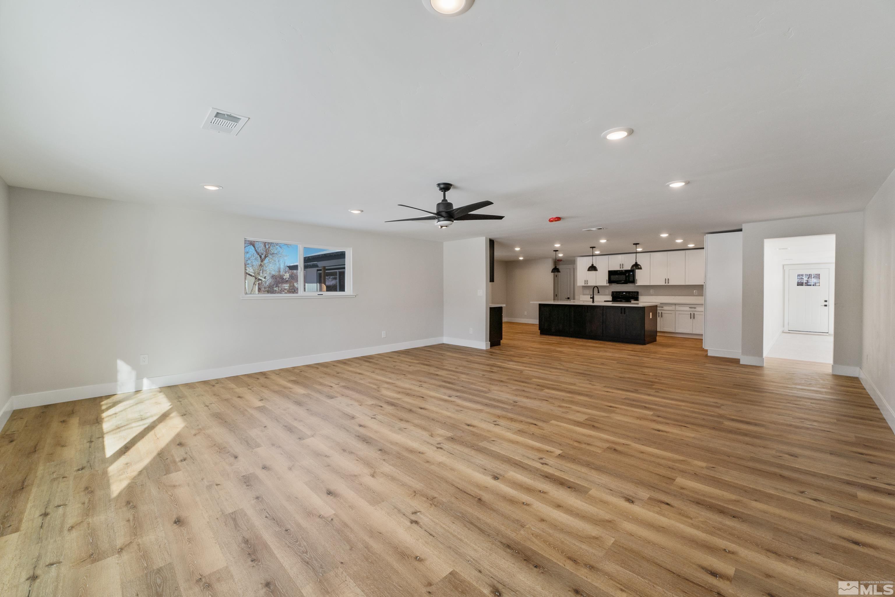 5 Sentinel Circle Carson City, NV 89701 - Photo 11 of 39 a view of a kitchen with a sink and a refrigerator