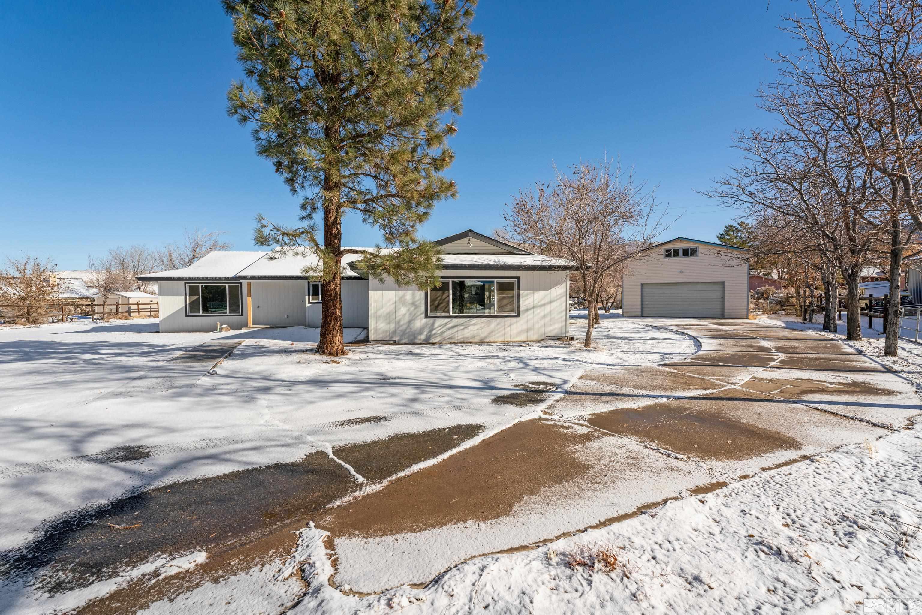 5 Sentinel Circle Carson City, NV 89701 - Photo 35 of 39 a front view of a house with a yard