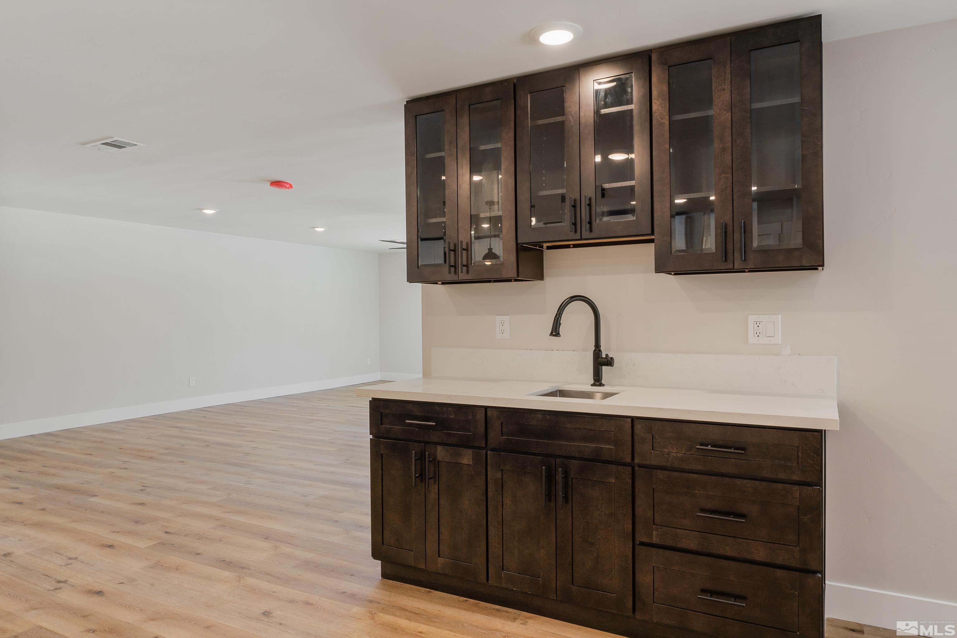 5 Sentinel Circle Carson City, NV 89701 - Photo 7 of 39 a bathroom with a sink and a mirror