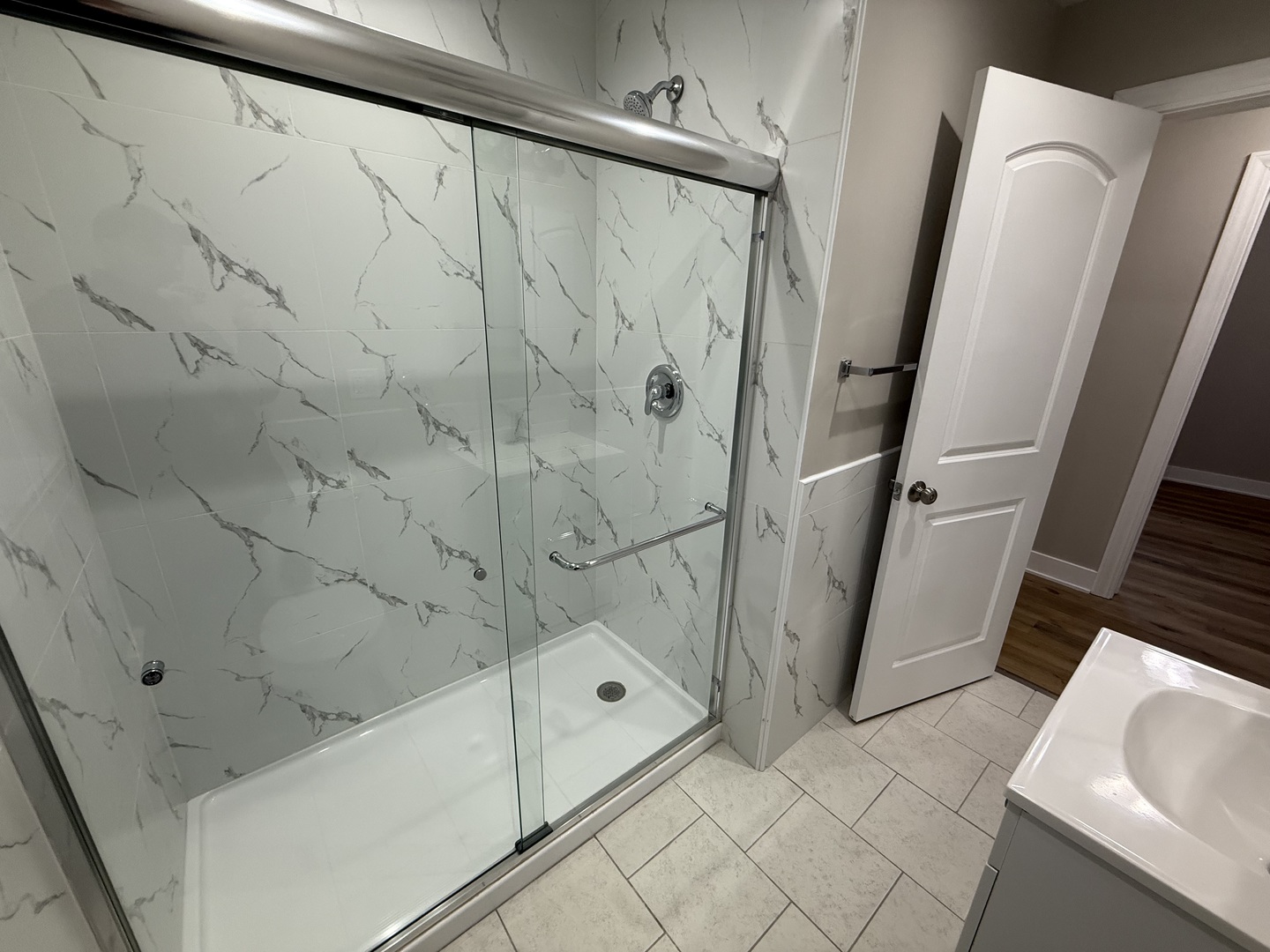 6634 Cermak Road, Unit 2 Berwyn, IL 60402 - Photo 17 of 20 a bathroom with a bathtub and a shower