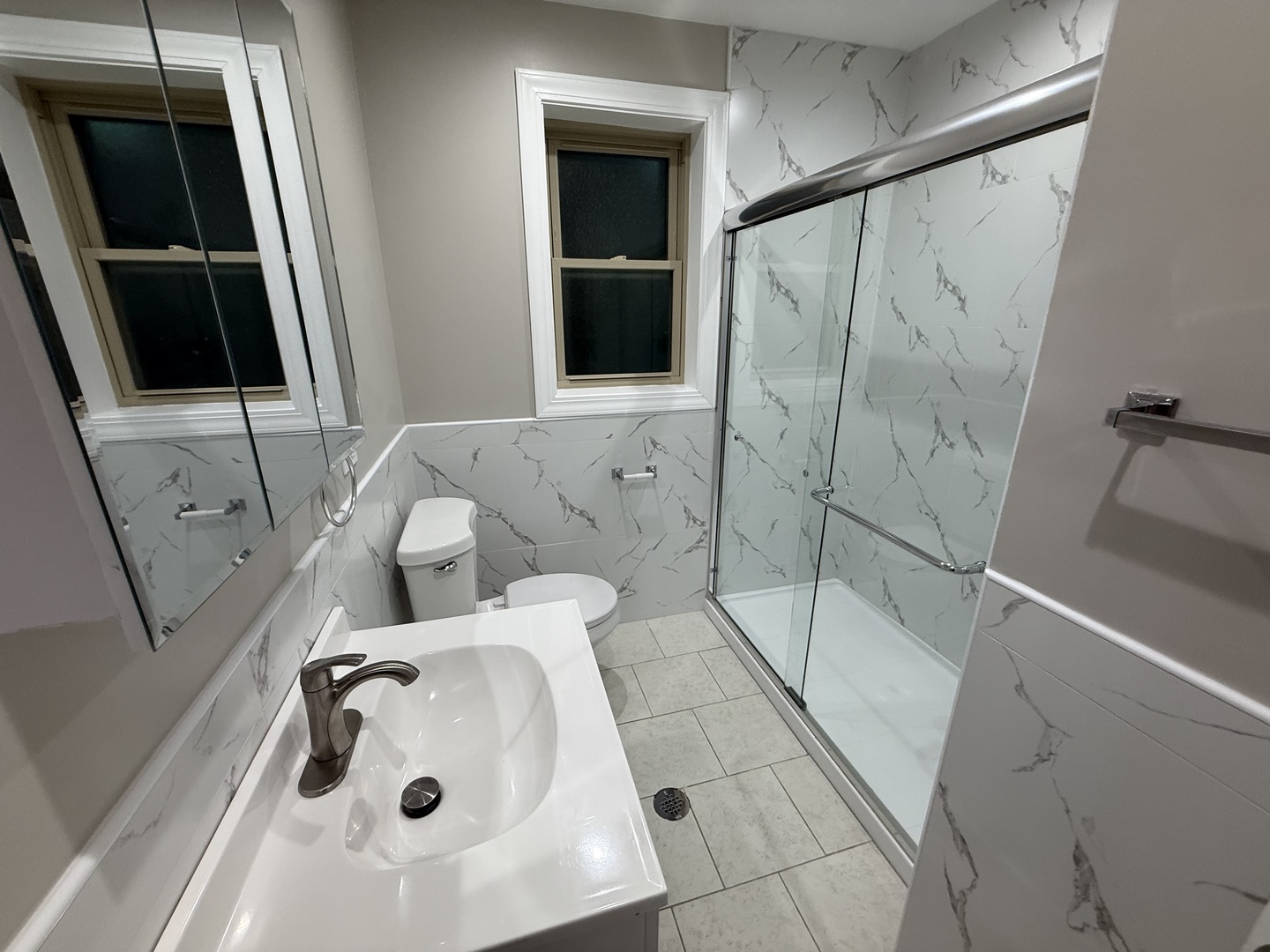 6634 Cermak Road, Unit 2 Berwyn, IL 60402 - Photo 20 of 20 a bathroom with a sink and glass door shower