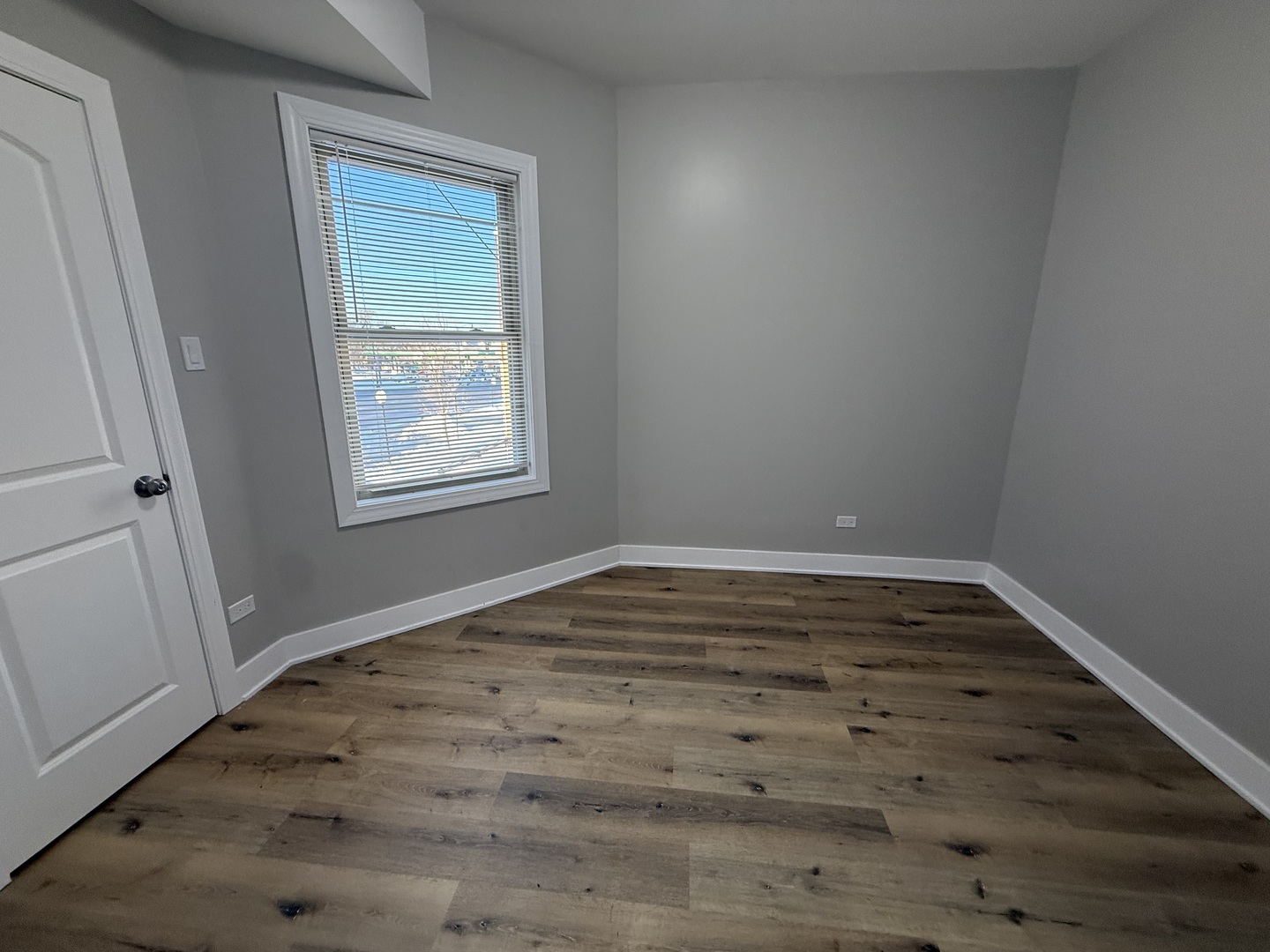 6634 Cermak Road, Unit 2 Berwyn, IL 60402 - Photo 8 of 20 a view of empty room with wooden floor and fan