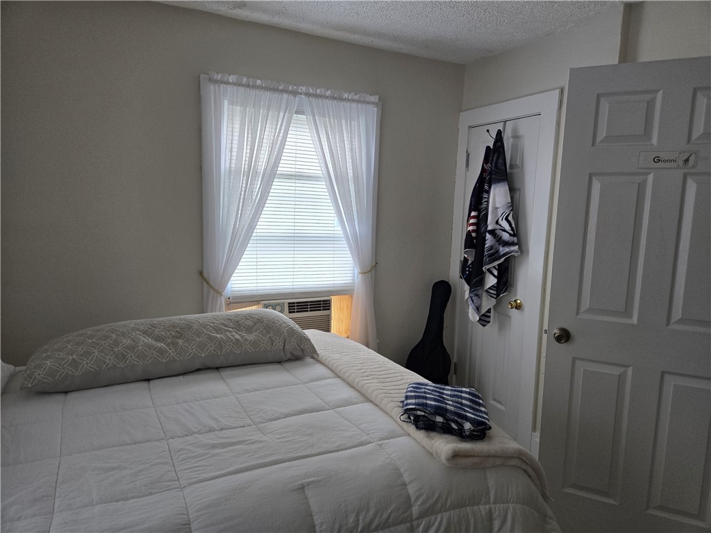 695-697 Culver Road Rochester, NY 14609 - Photo 36 of 50 There is a closet behind the bedroom door.