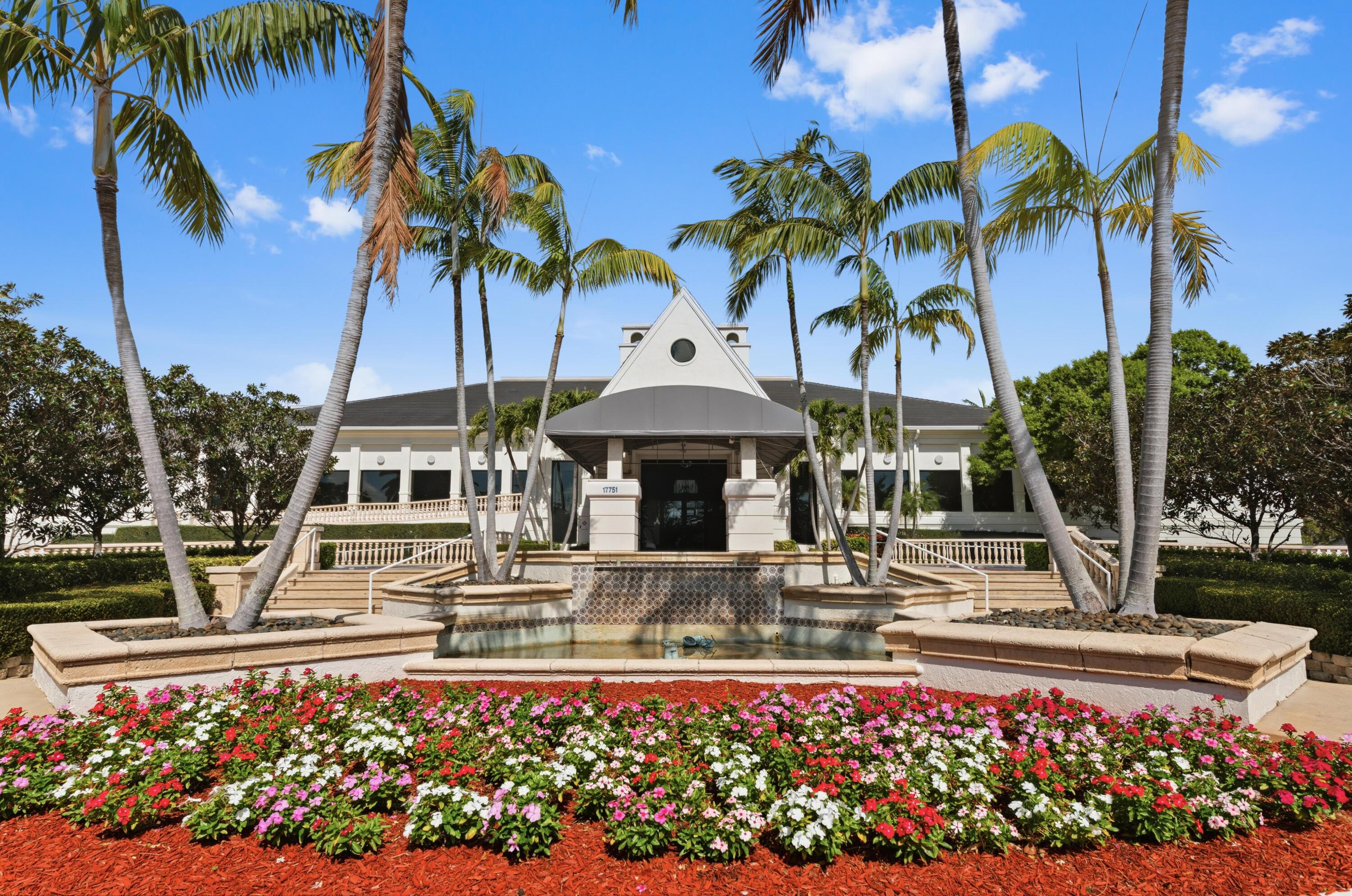 17221 Boca Club Boulevard, Unit 3 Boca Raton, FL 33487 - Photo 33 of 47 a front view of a house with swimming pool