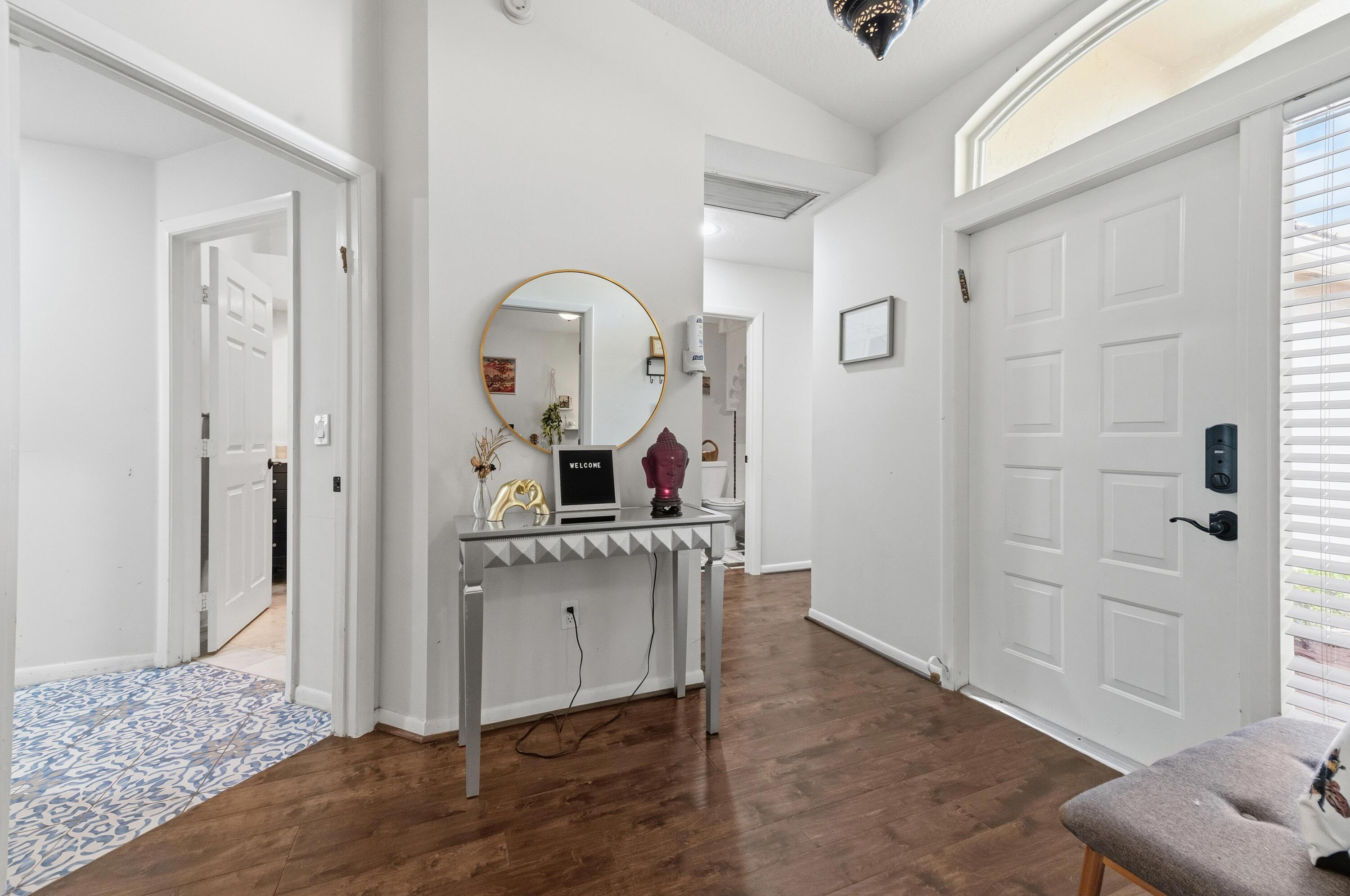 17221 Boca Club Boulevard, Unit 3 Boca Raton, FL 33487 - Photo 4 of 47 a view of living room with furniture and mirror