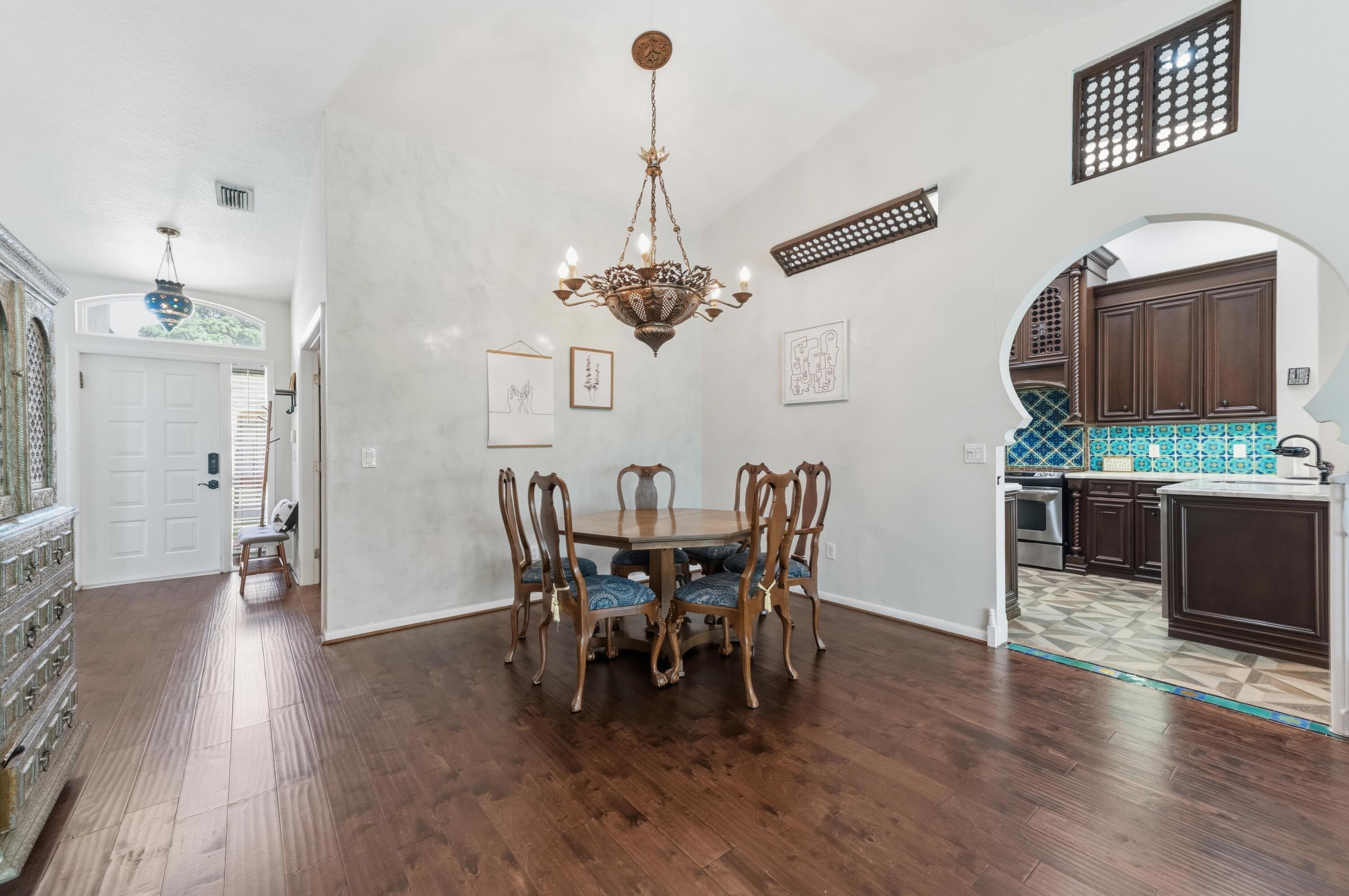 17221 Boca Club Boulevard, Unit 3 Boca Raton, FL 33487 - Photo 9 of 47 a dining room with furniture and window
