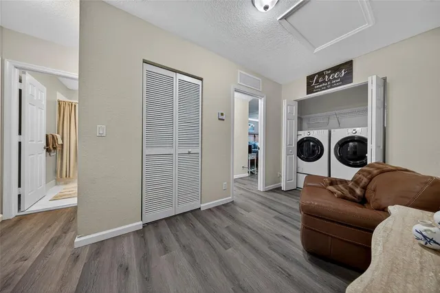 a livingroom with furniture and a window