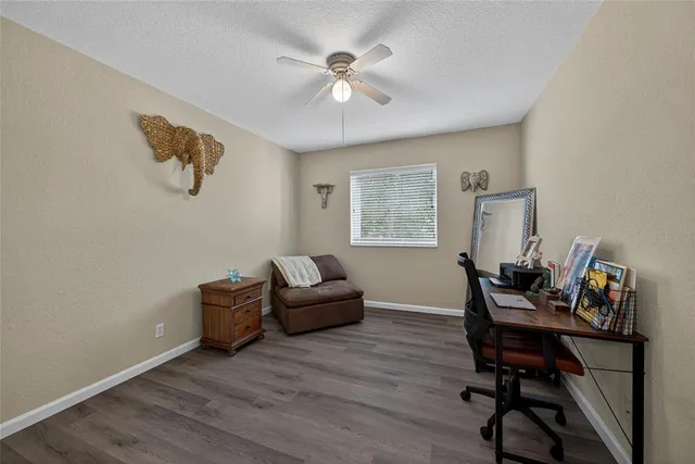 a workspace with furniture and a window