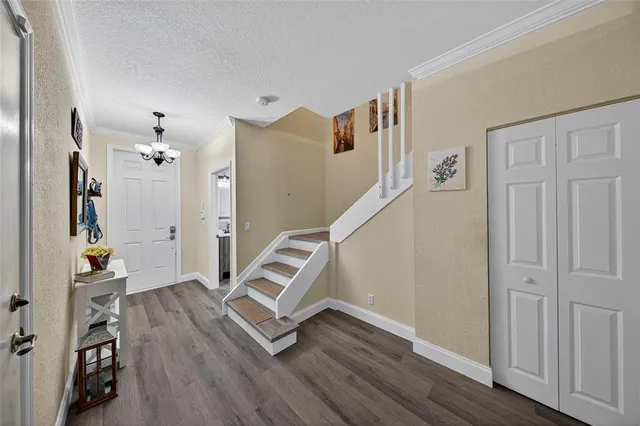a view of livingroom with furniture and wooden floor