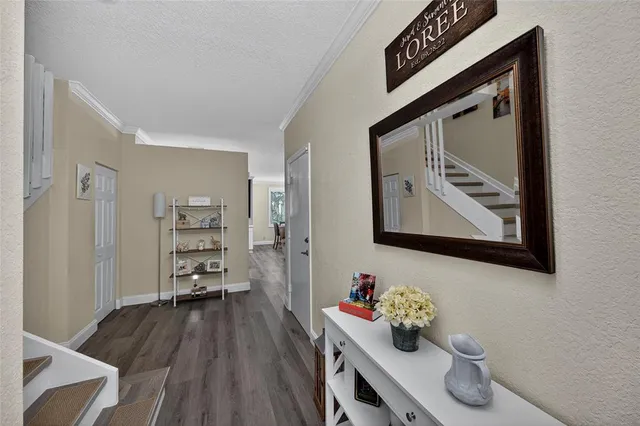 a bathroom with a toilet and a mirror