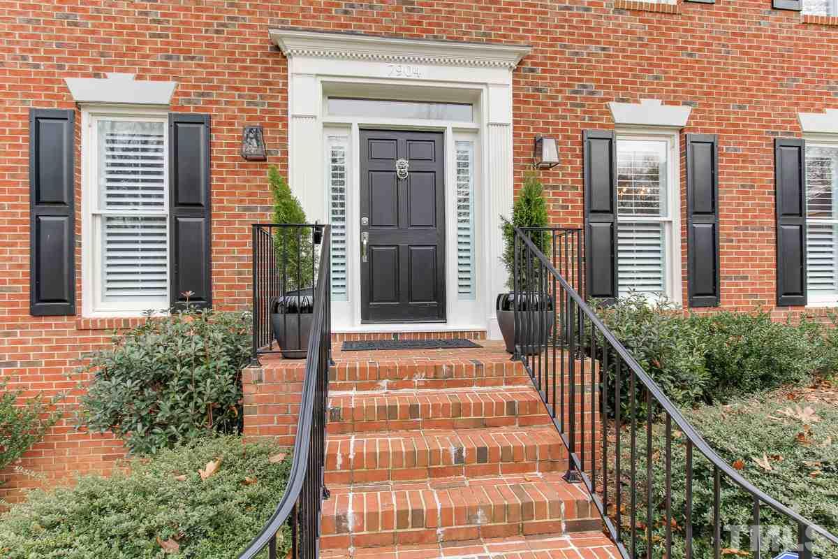 7904 Ogden Court Raleigh, NC 27613 - Photo 2 of 25 a front view of a house with a porch