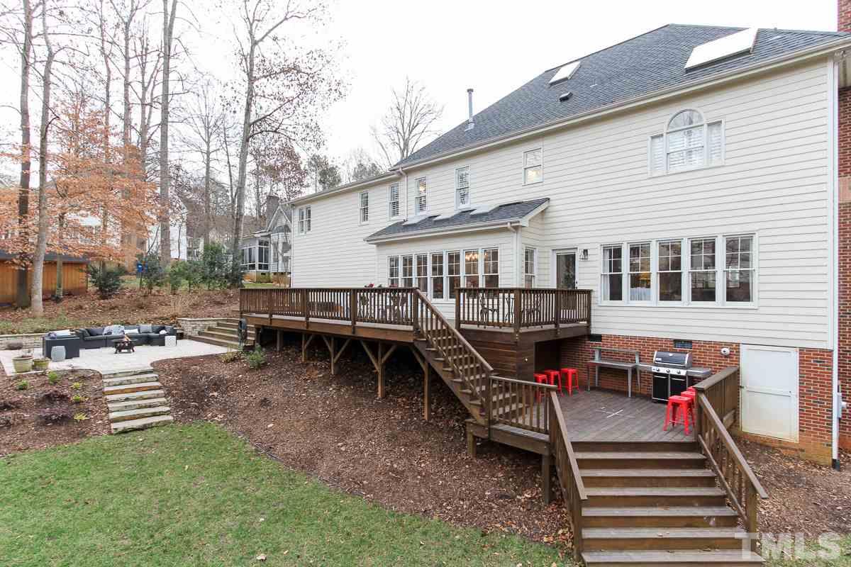 7904 Ogden Court Raleigh, NC 27613 - Photo 25 of 25 a view of a house with backyard and sitting area