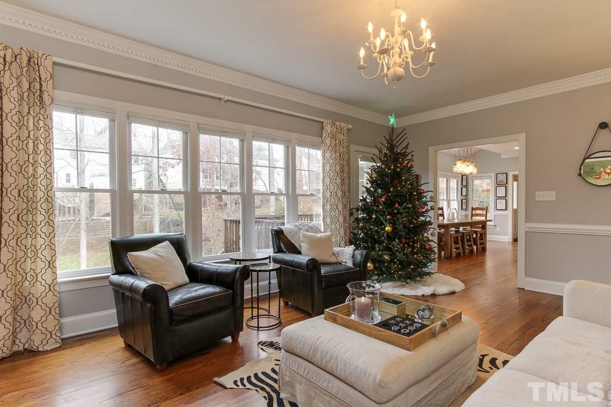 7904 Ogden Court Raleigh, NC 27613 - Photo 6 of 25 a living room with furniture and a large window
