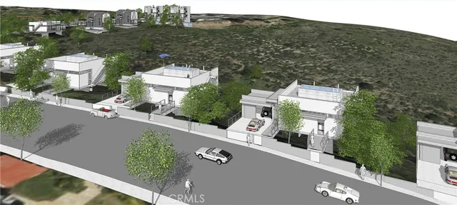 an aerial view of a house with a garden