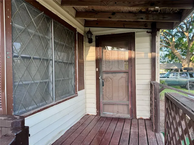 a view of outdoor space and wooden deck