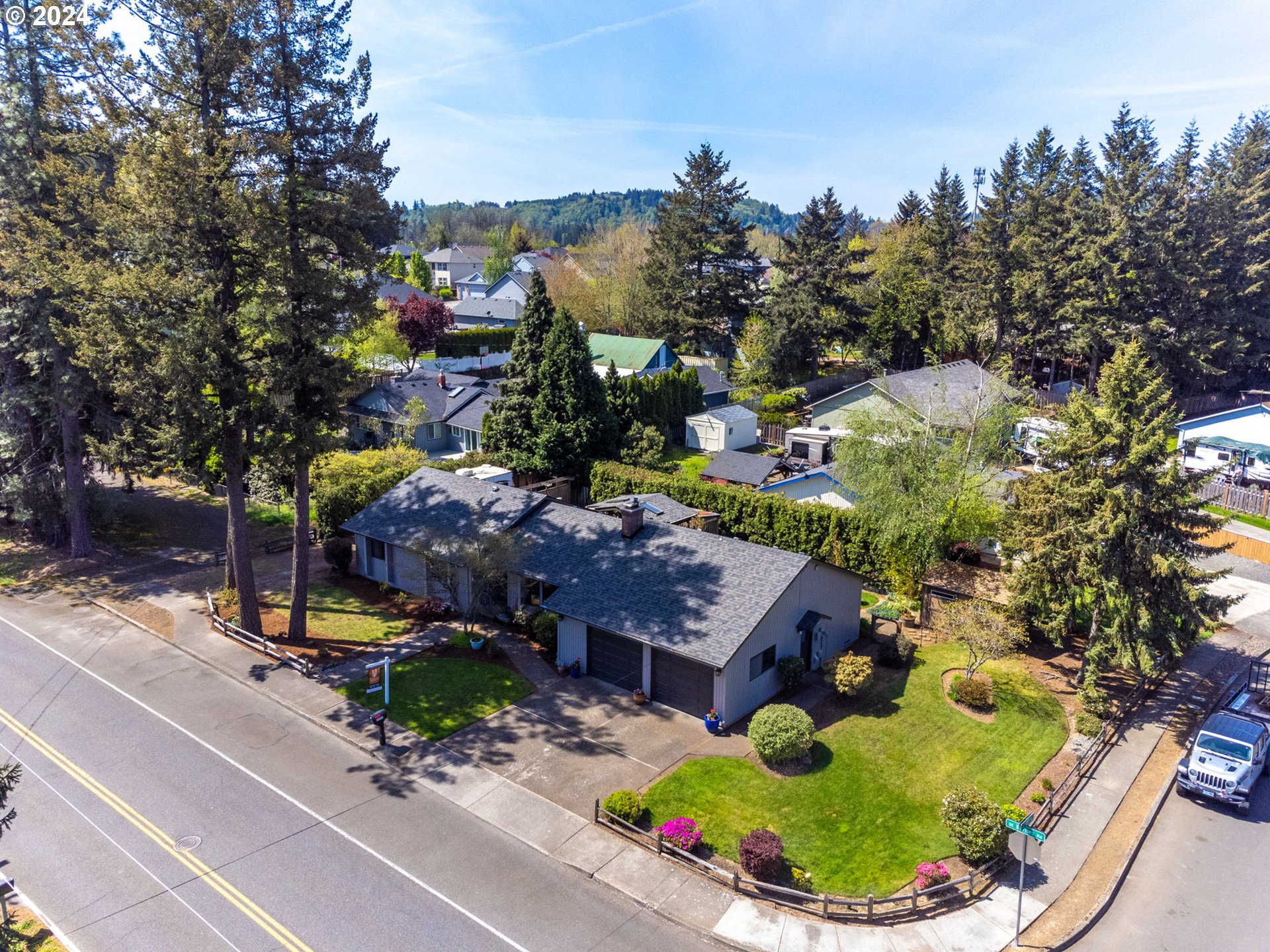 a aerial view of a house with a garden and plants