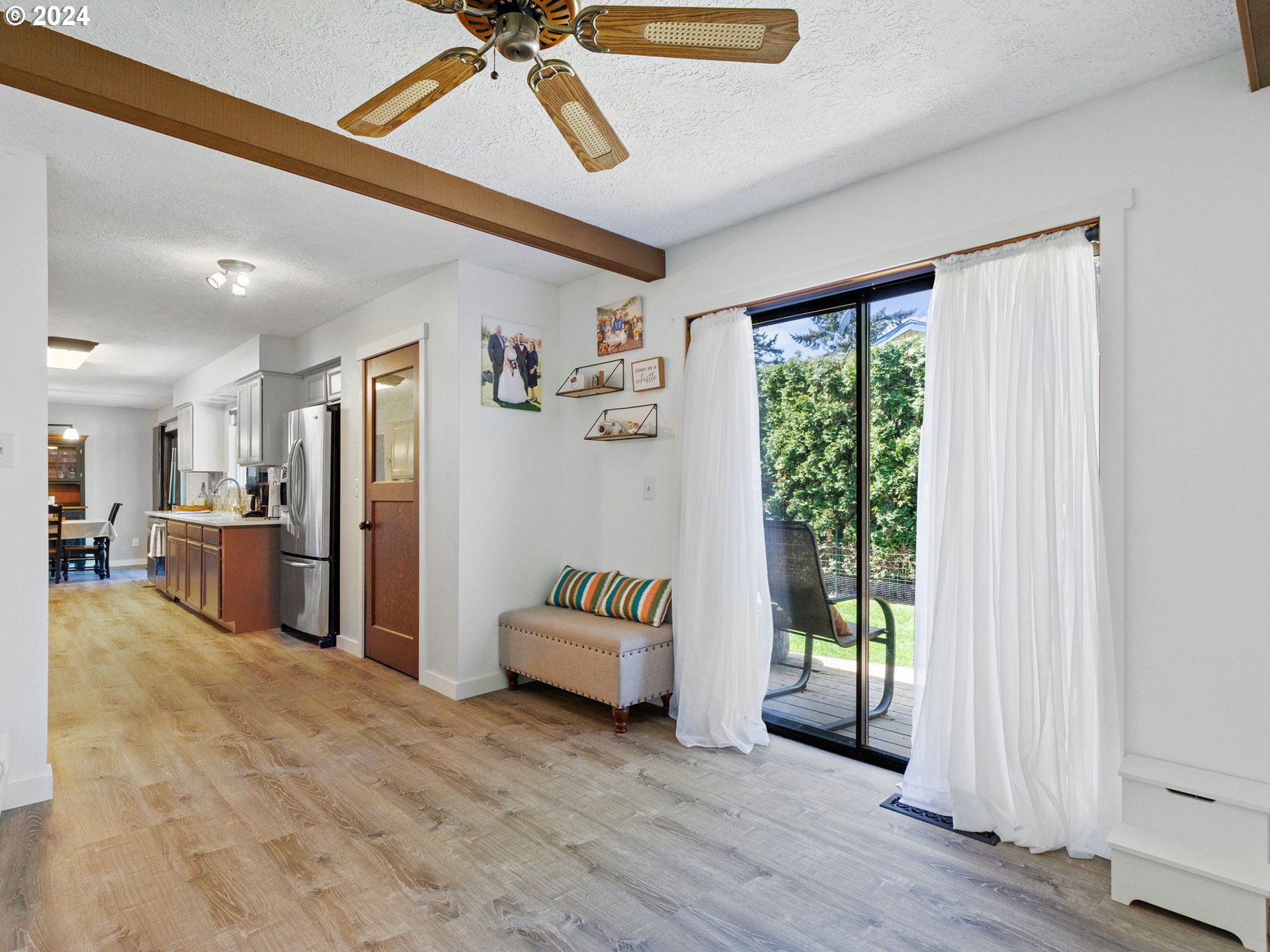 2551 Southeast Barnes Road Gresham, OR 97080 - Photo 17 of 38 a living room with furniture and a large window