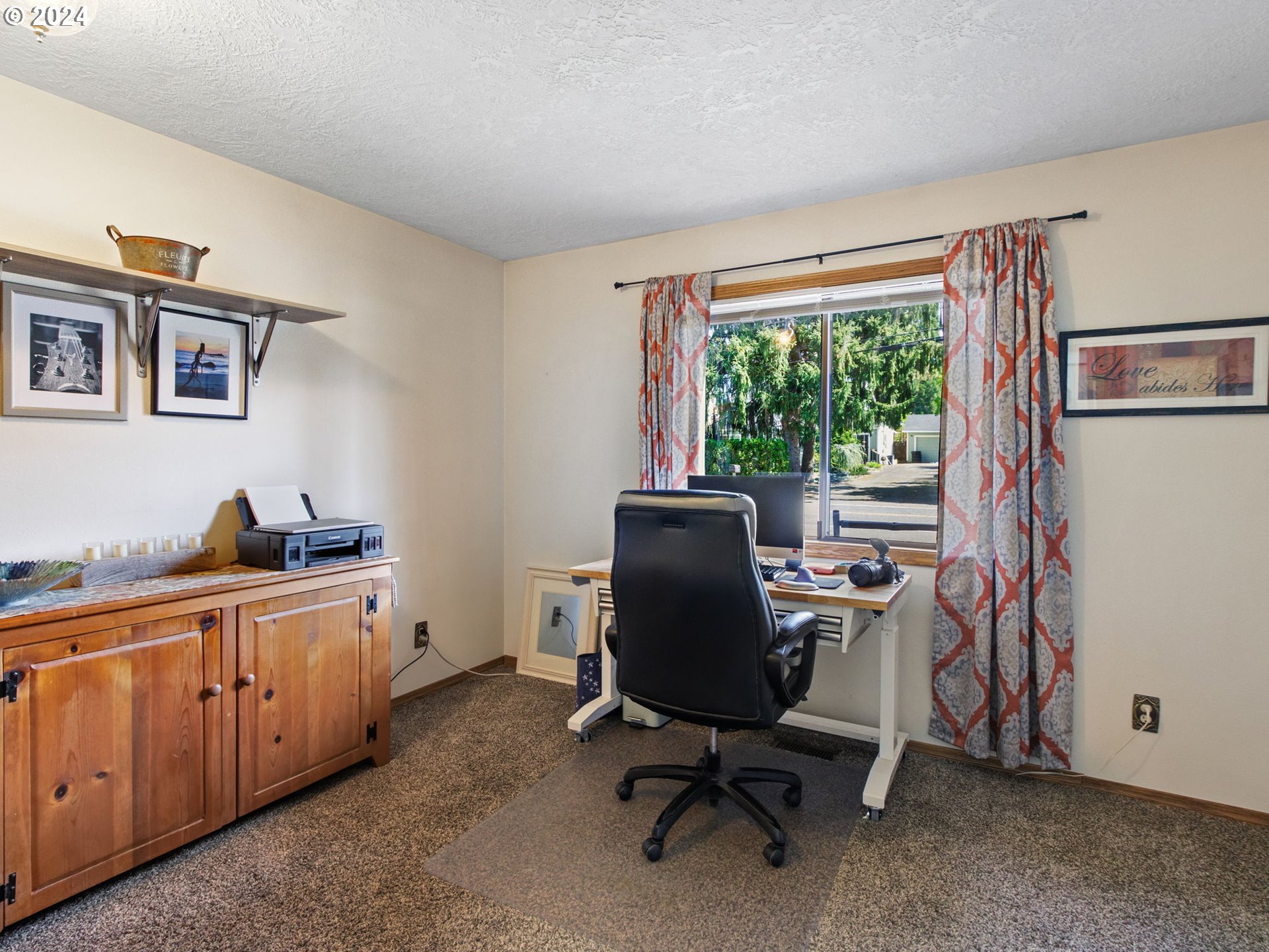 2551 Southeast Barnes Road Gresham, OR 97080 - Photo 21 of 38 a view of a workspace with furniture and a window