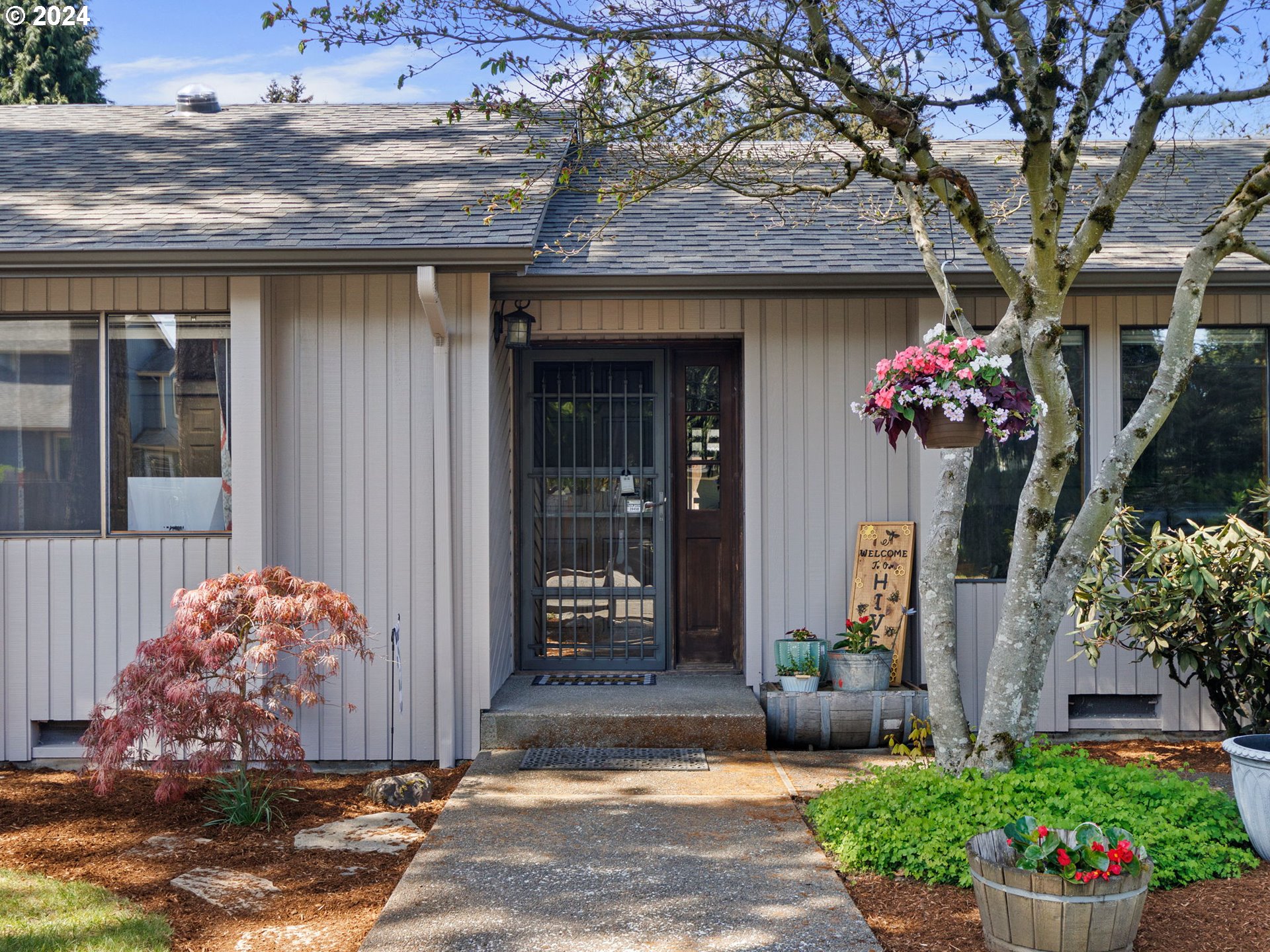 2551 Southeast Barnes Road Gresham, OR 97080 - Photo 3 of 38 a front view of a house