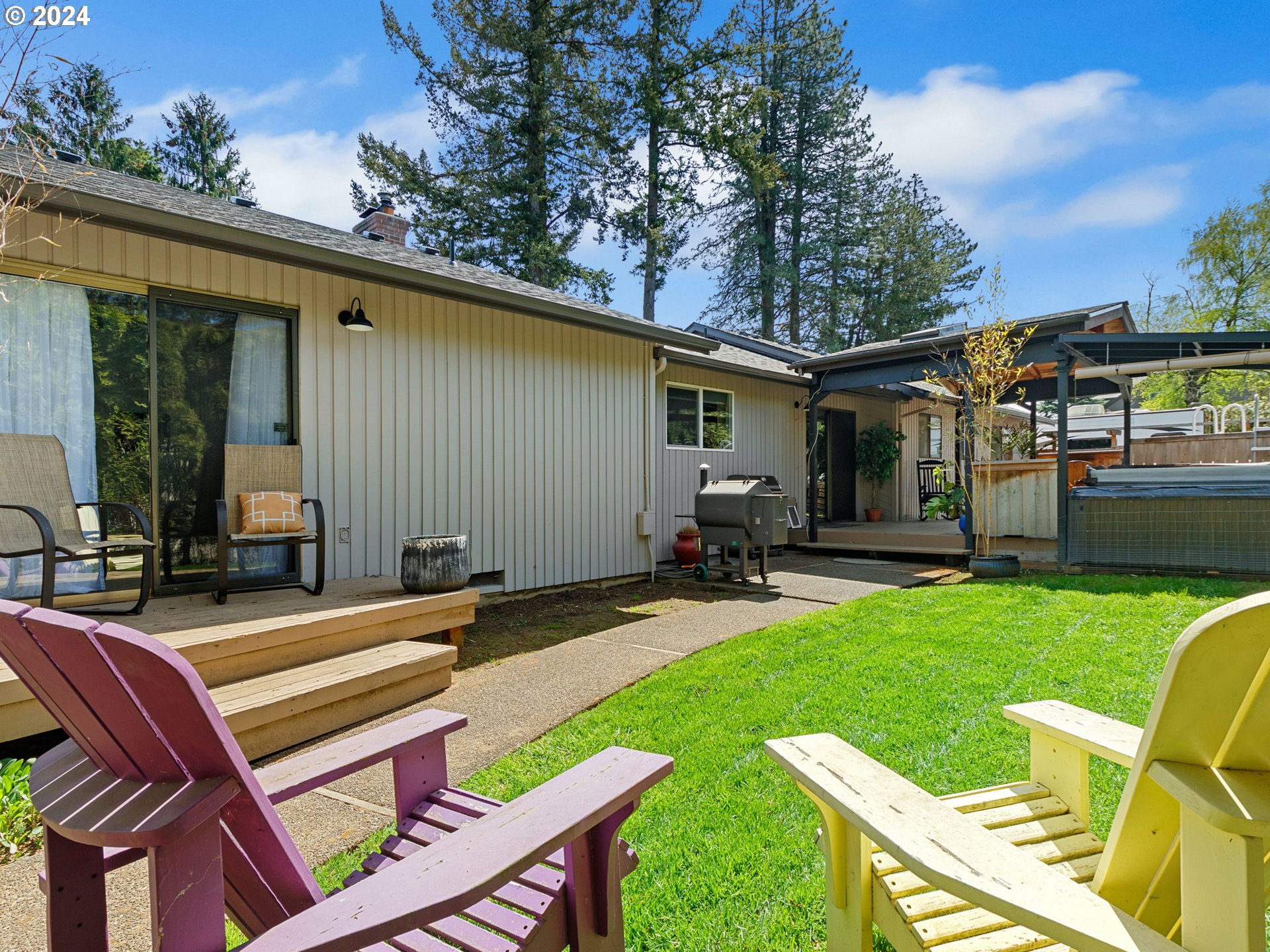 2551 Southeast Barnes Road Gresham, OR 97080 - Photo 31 of 38 a backyard of a house with seating space