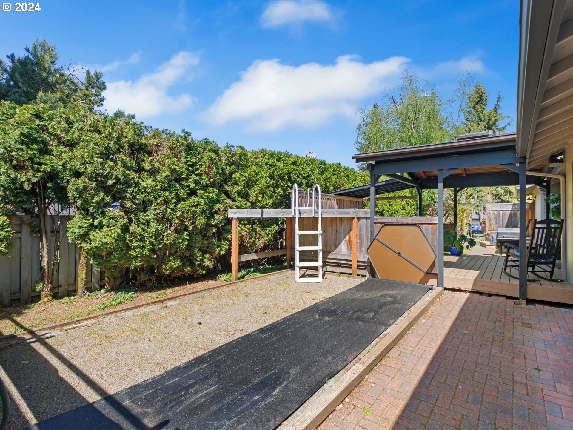 2551 Southeast Barnes Road Gresham, OR 97080 - Photo 32 of 38 a view of a roof deck with wooden floor and seating space