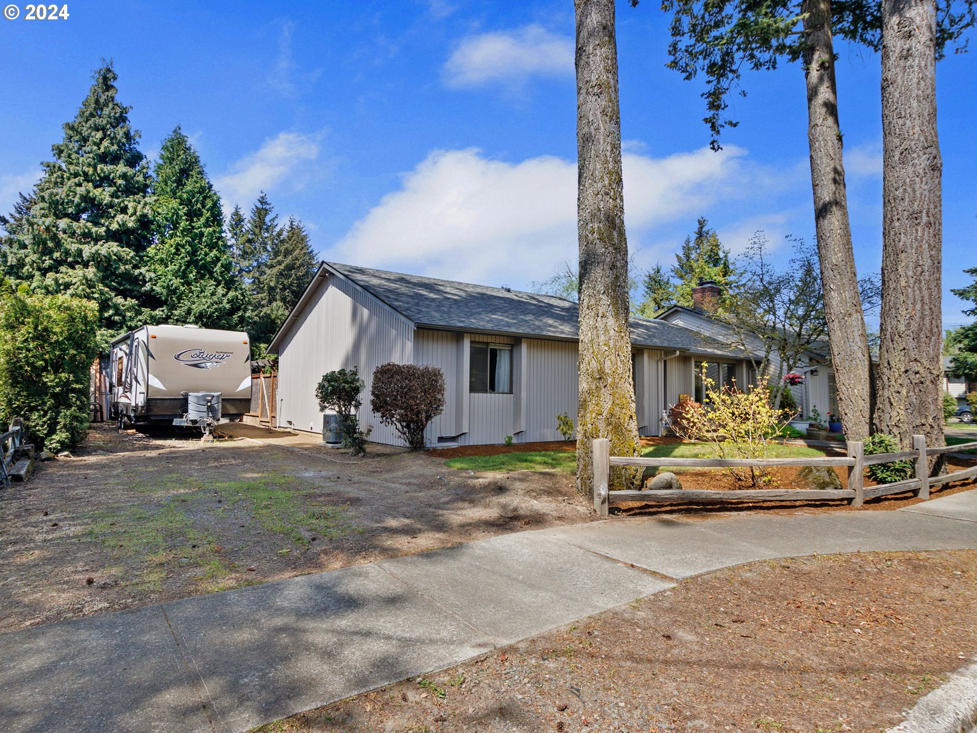 2551 Southeast Barnes Road Gresham, OR 97080 - Photo 35 of 38 a view of a house with backyard and sitting area