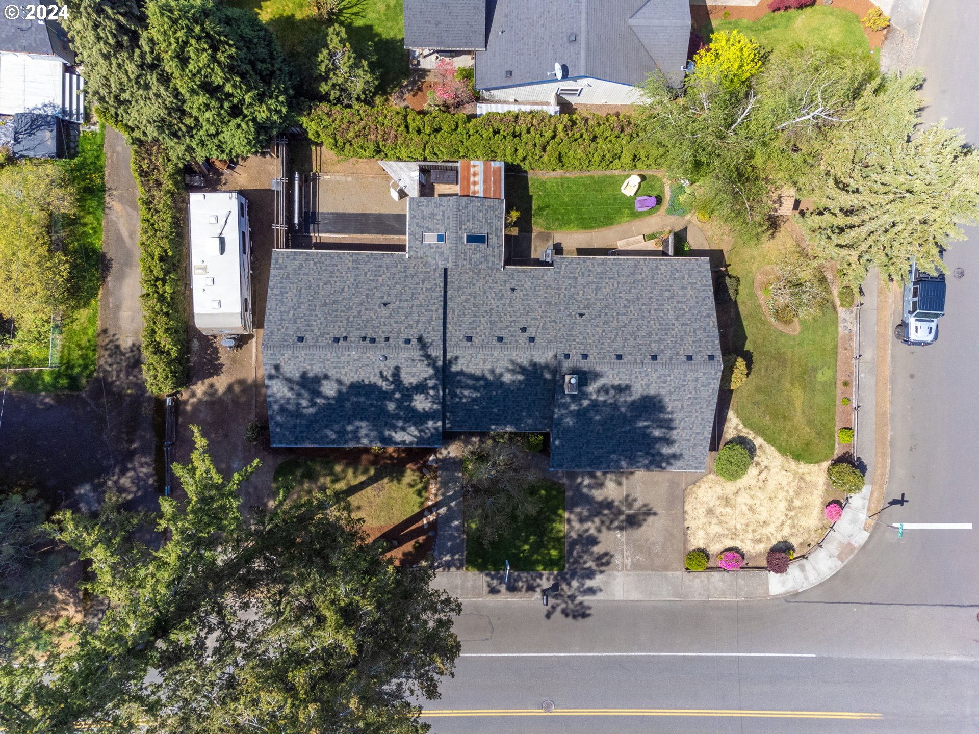 2551 Southeast Barnes Road Gresham, OR 97080 - Photo 36 of 38 an aerial view of a house with a yard and a large tree