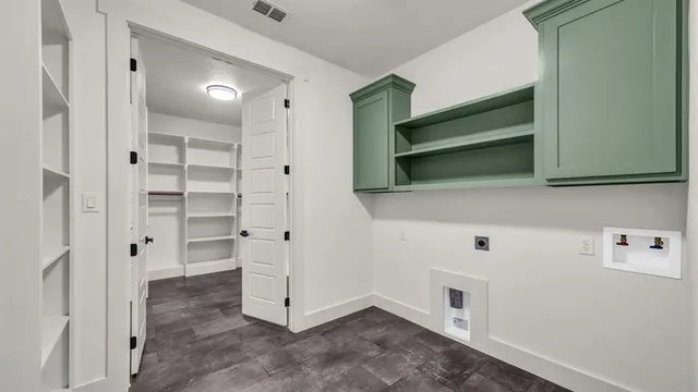 a view of cabinets and window