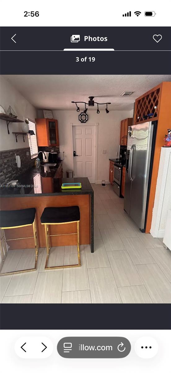 20530 Eagle Nest Road Cutler Bay, FL 33189 - Photo 11 of 24 a living room with furniture