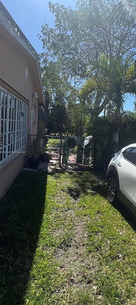 20530 Eagle Nest Road Cutler Bay, FL 33189 - Photo 16 of 17 a view of a yard with swimming pool