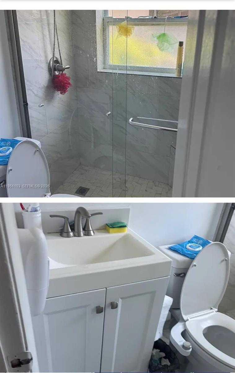 20530 Eagle Nest Road Cutler Bay, FL 33189 - Photo 24 of 24 a bathroom with a sink and a mirror