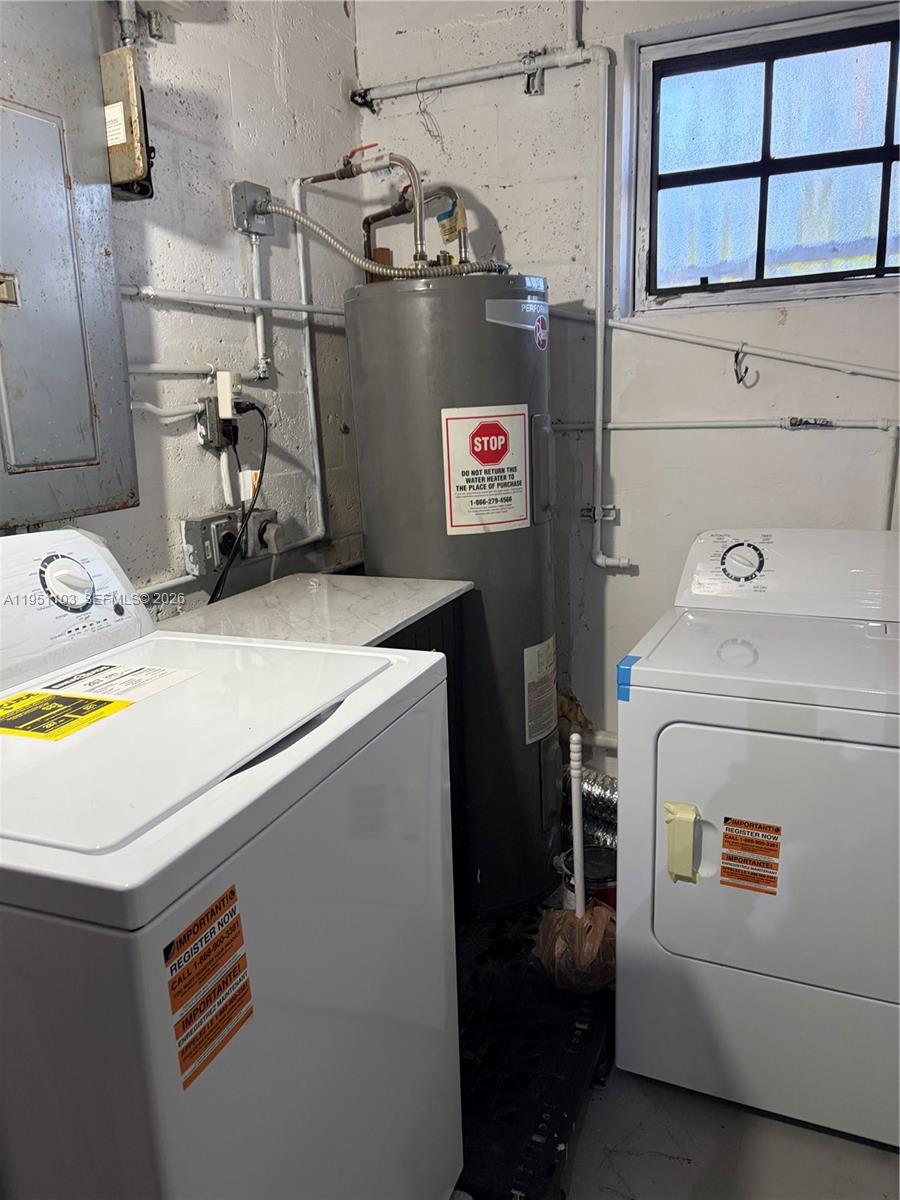 20530 Eagle Nest Road Cutler Bay, FL 33189 - Photo 5 of 17 a utility room with dryer and washer