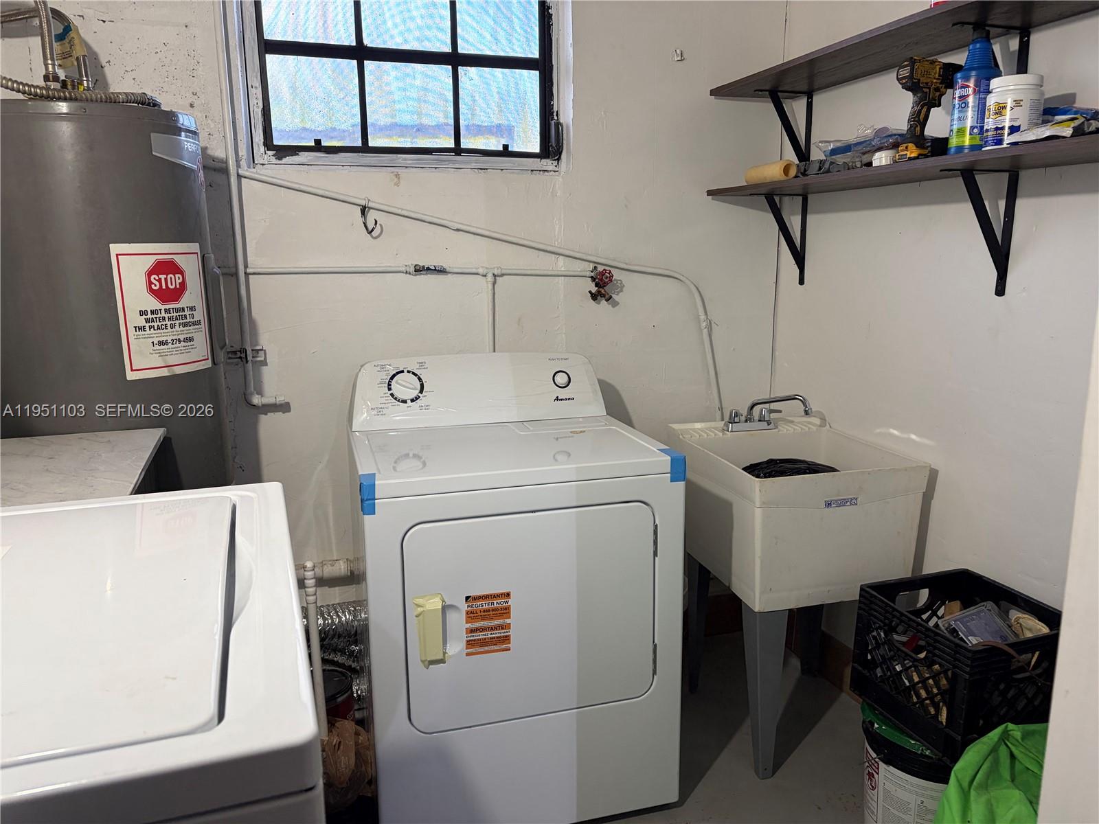 20530 Eagle Nest Road Cutler Bay, FL 33189 - Photo 10 of 17 a utility room with dryer and washer