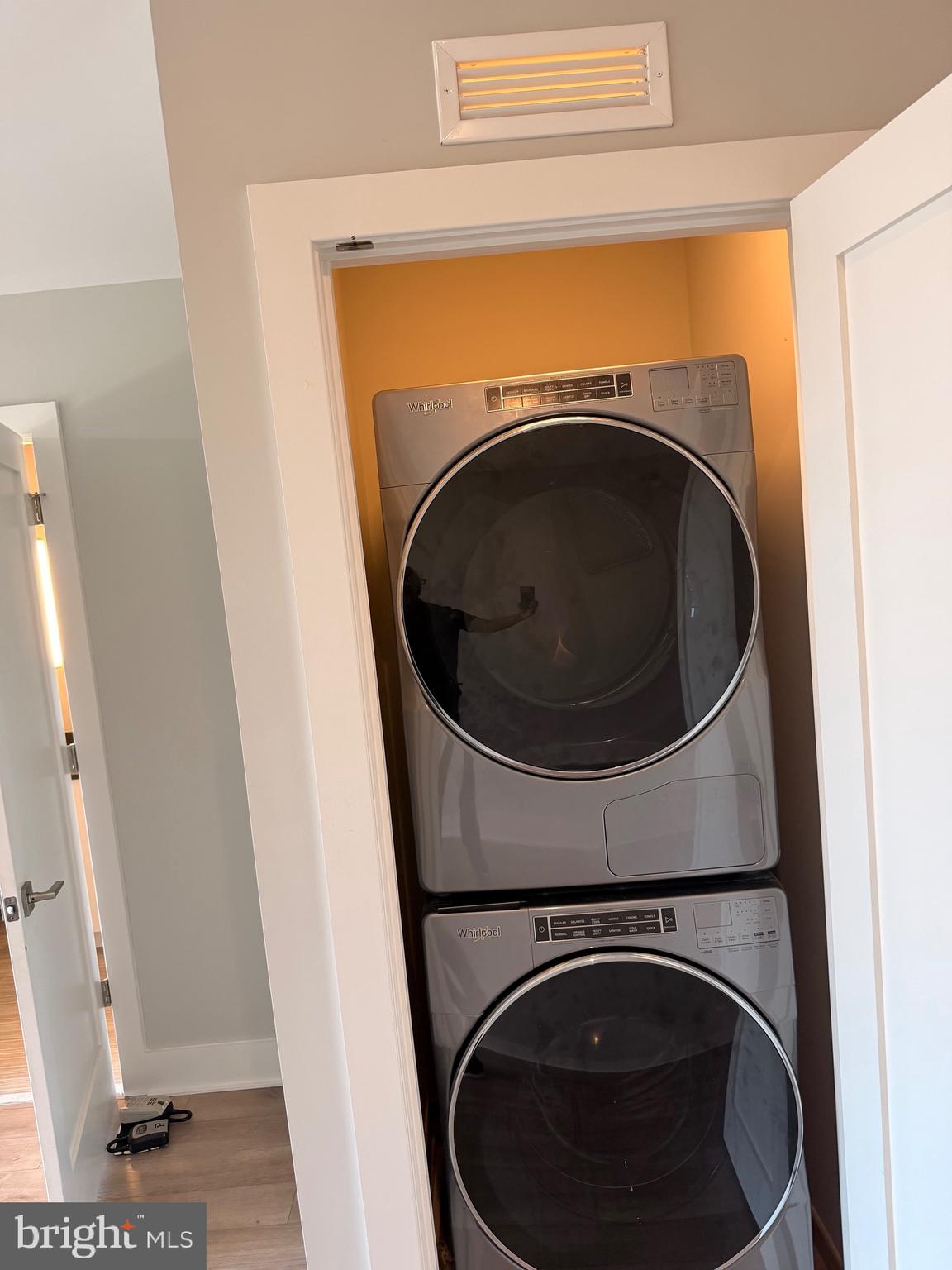 88 V Street Southwest, Unit 810 Washington, DC 20024 - Photo 14 of 14 a utility room with dryer and washer
