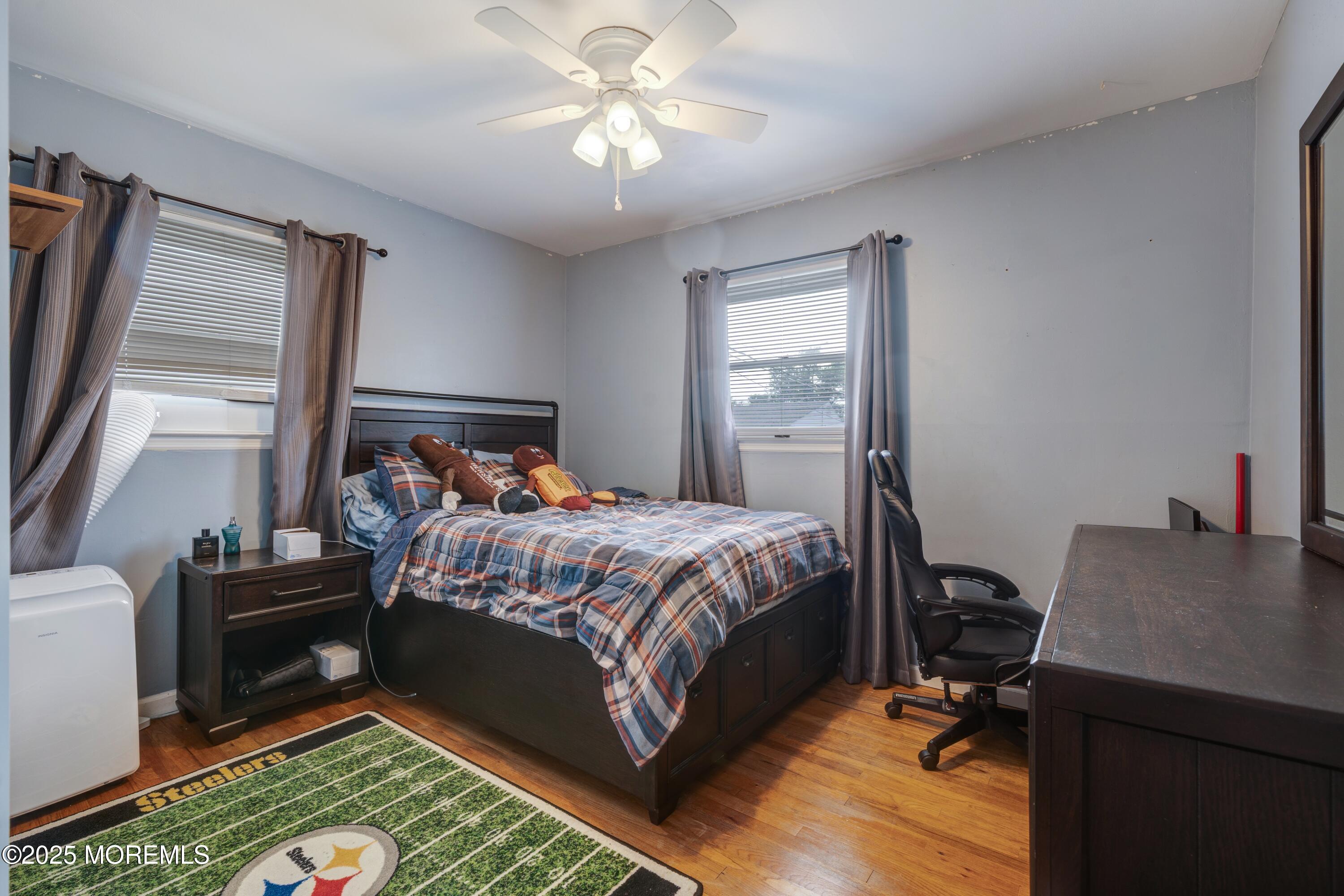 7 Carriage Road Hazlet, NJ 07730 - Photo 15 of 33 a bedroom with a bed window and a desk