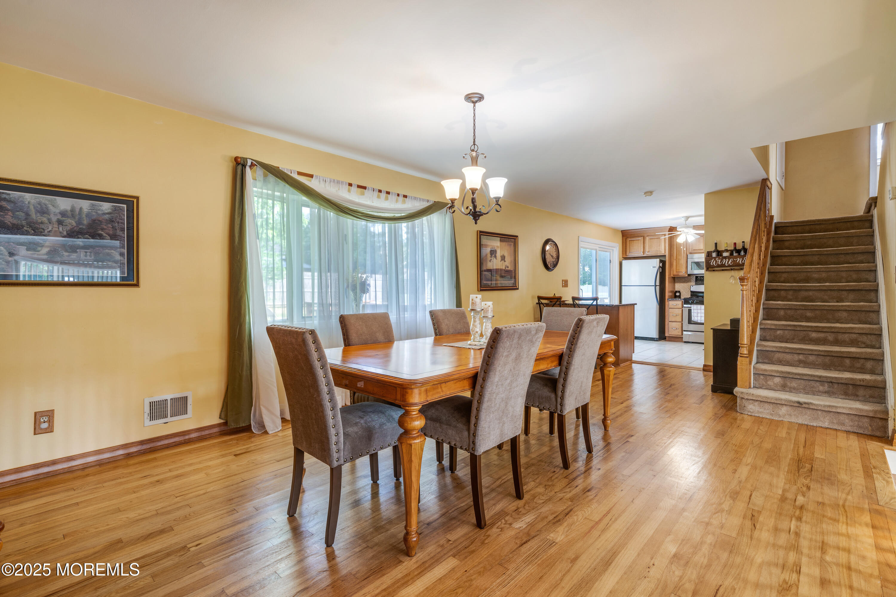 7 Carriage Road Hazlet, NJ 07730 - Photo 10 of 33 a view of a dining room with furniture window and wooden floor
