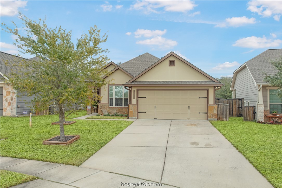 15416 Baker Meadow Loop College Station, TX 77845 - Photo 1 of 1 a front view of a house with a yard