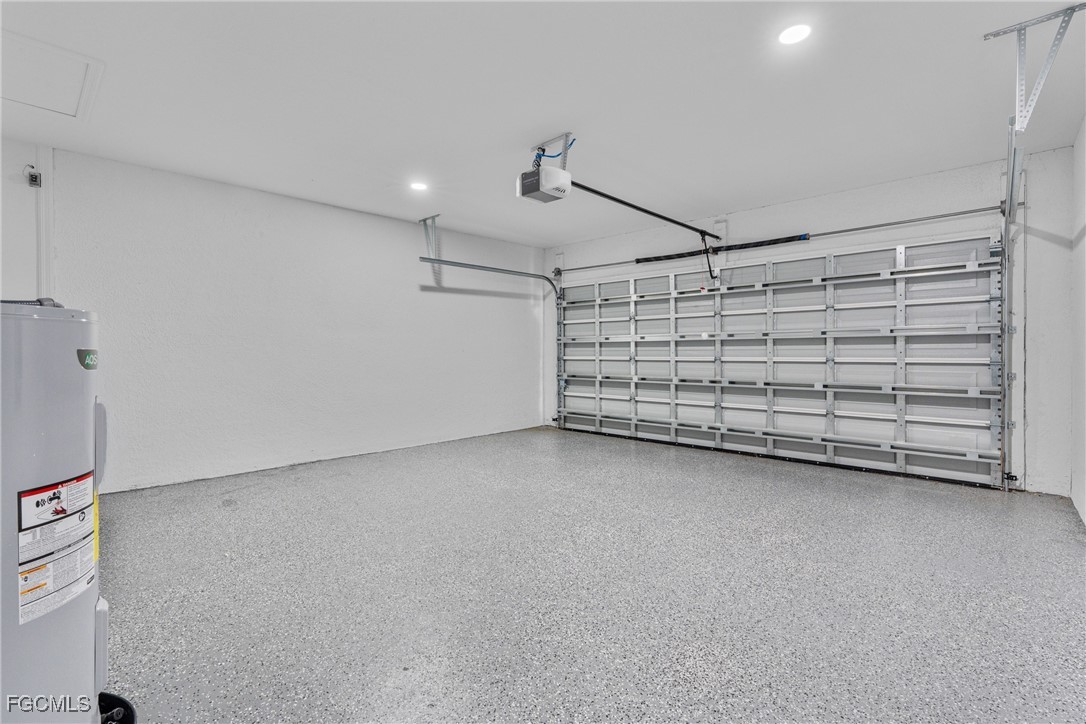 945 Butler Street East Lehigh Acres, FL 33974 - Photo 27 of 34 a view of a room with an empty space