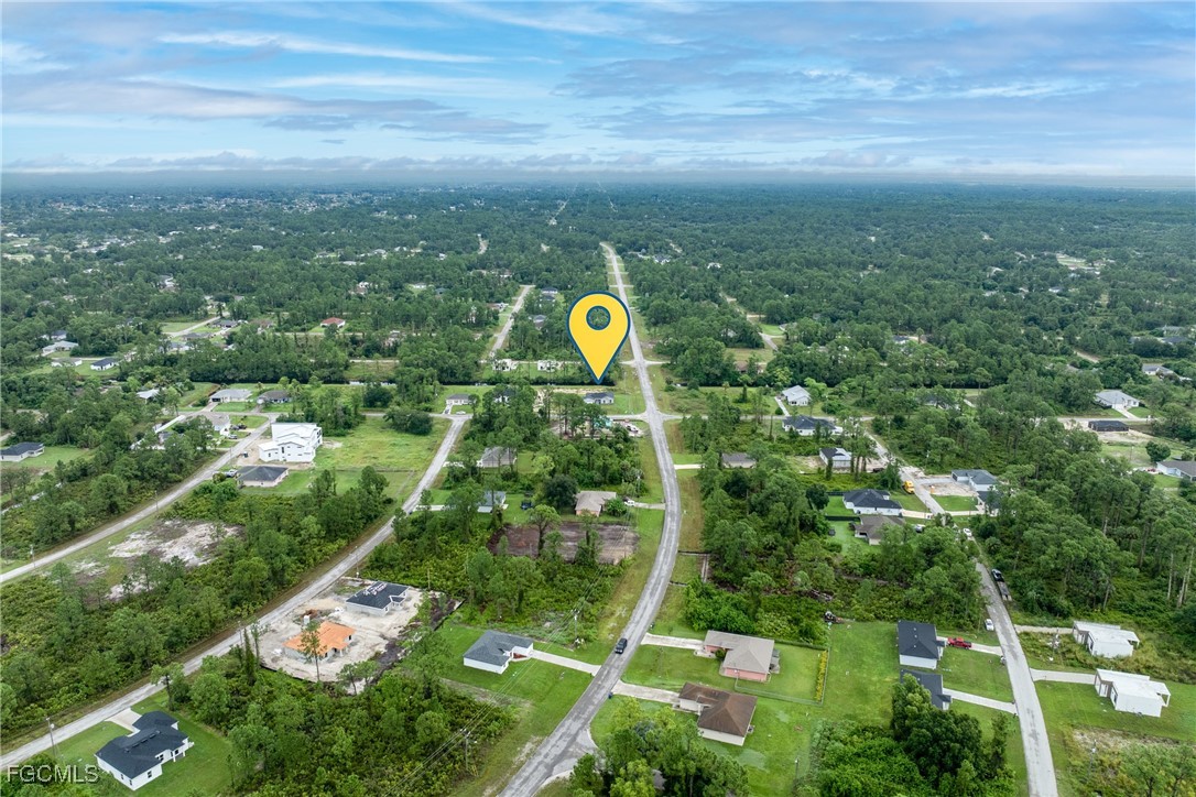 945 Butler Street East Lehigh Acres, FL 33974 - Photo 33 of 34 a view of a city