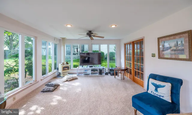 a bathroom with a sink and mirror with toilet