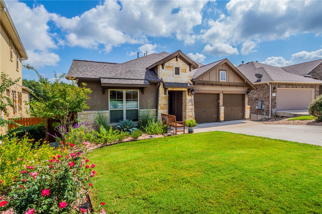 5113 Inks Clearing Lane Austin, TX 78738 - Photo 1 of 1 a front view of a house with swimming pool and porch with green space