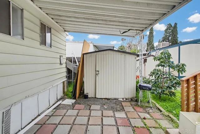 a yellow house with outdoor space
